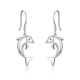 Dolphin dangle earrings