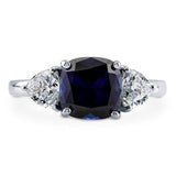 Rhodium Plated Sterling Silver Simulated Blue Sapphire Cushion Cut Cubic Zirconia CZ 3-Stone Anniversary Engagement Ring