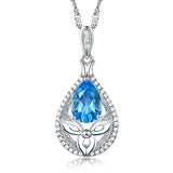 Silver lucky shamrock carries a drop-shaped Blue Topaz Pendant Necklace