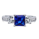 Rhodium Plated Sterling Silver Simulated Blue Sapphire Princess Cut Cubic Zirconia CZ 3-Stone Anniversary Promise Engagement Ring