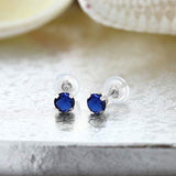 14K Gold Blue Created Sapphire Stud Earrings  For Women