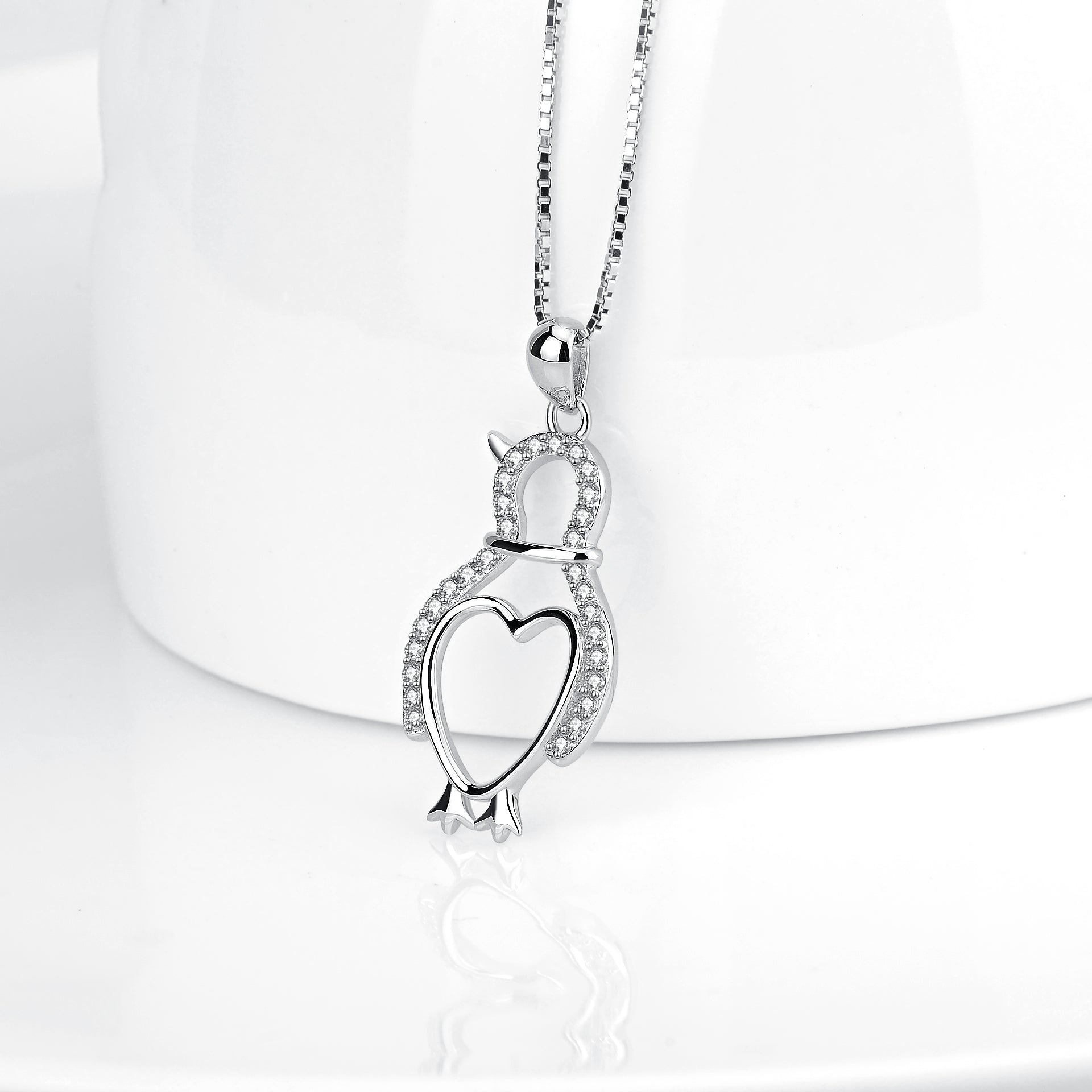 Adorable penguin necklace made of sterling silver in the shape of an Antarctic penguin